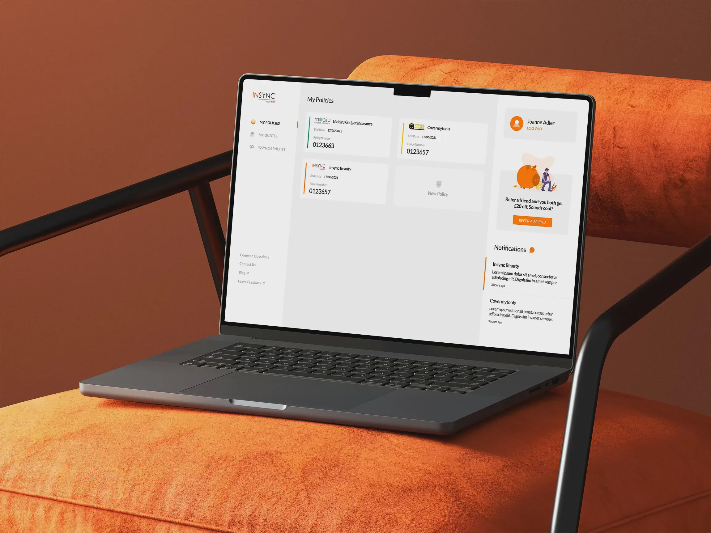 An open MacBook laptop resting on an orange velvet chair, displaying the Insync Insurance dashboard with widgets.